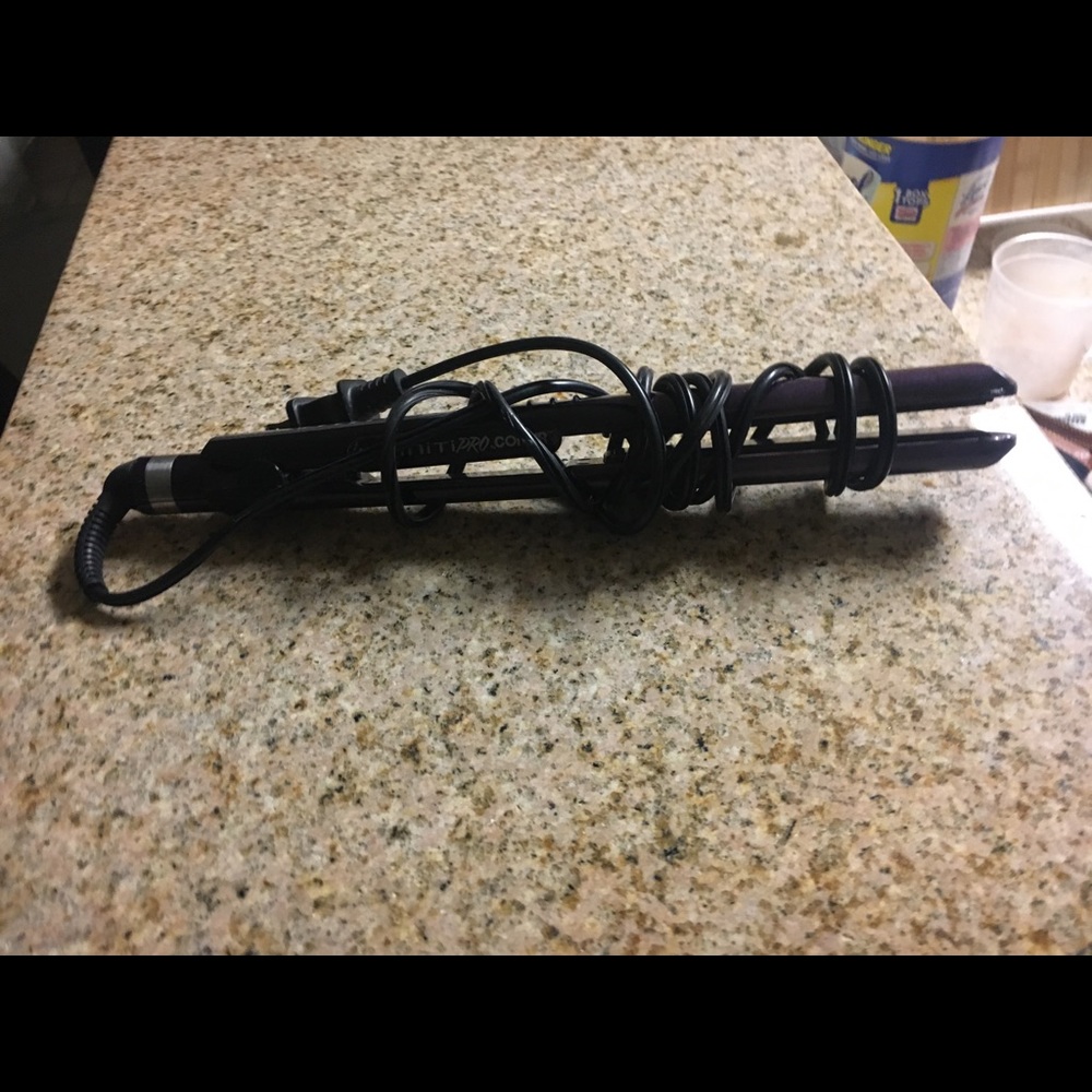 Hair straightener. I have 2 available. $15 each